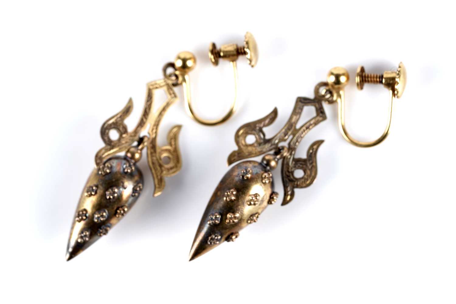Lot 773 - A pair of Victorian hollow cast gold earrings