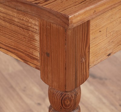Lot 40 - A vintage pitch pine farmhouse dining table