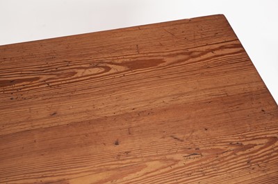 Lot 40 - A vintage pitch pine farmhouse dining table