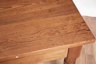 Lot 40 - A vintage pitch pine farmhouse dining table