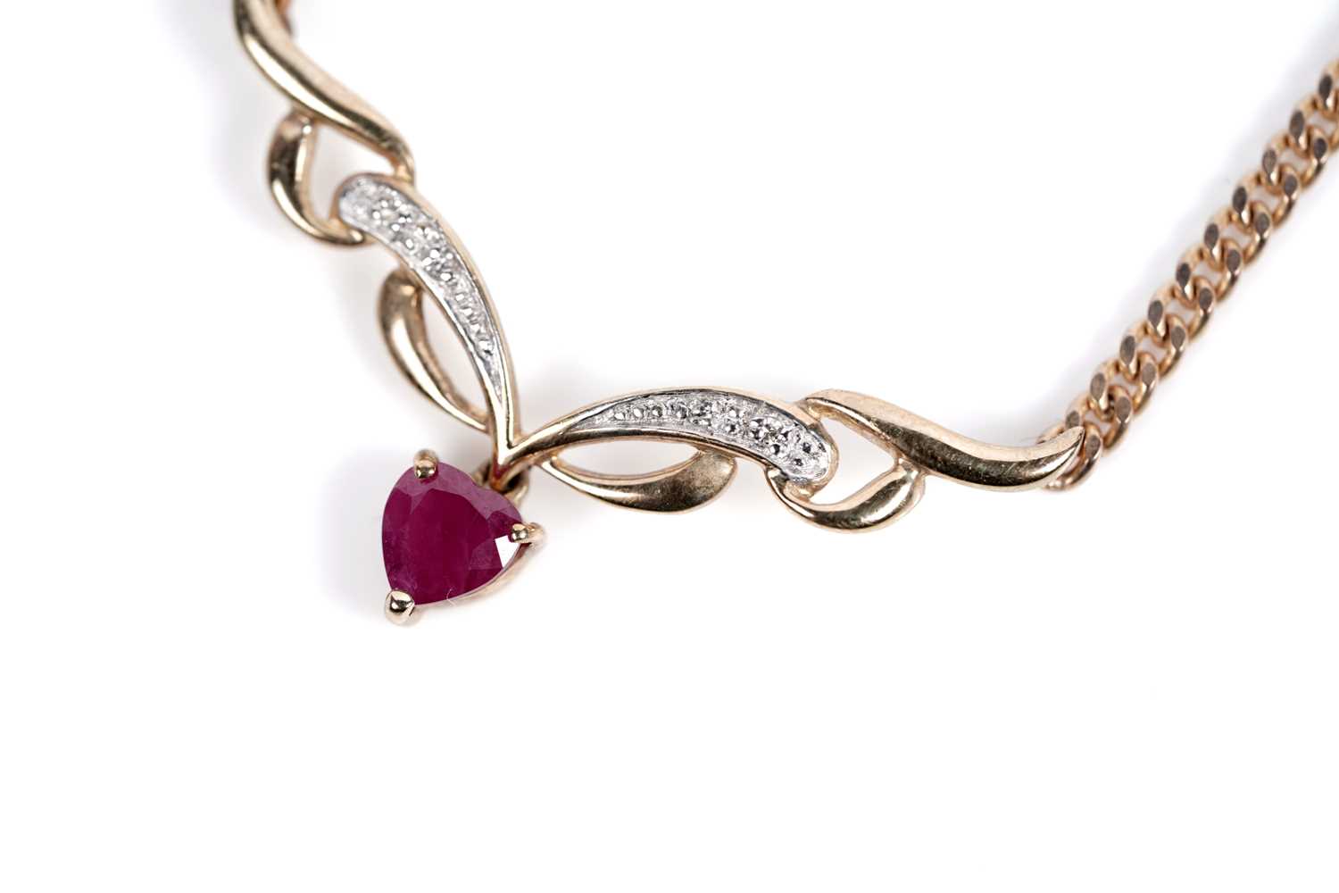 Lot 603 - A ruby and diamond drop pendant necklet