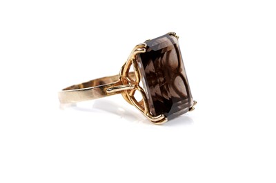 Lot 582 - A smoky quartz cocktail ring