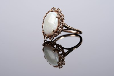 Lot 583 - An opal cabochon cocktail ring