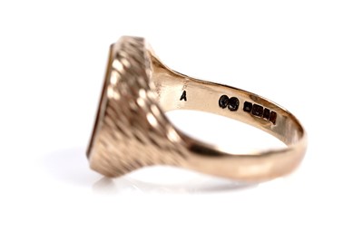 Lot 585 - Two tiger's eye quartz signet rings