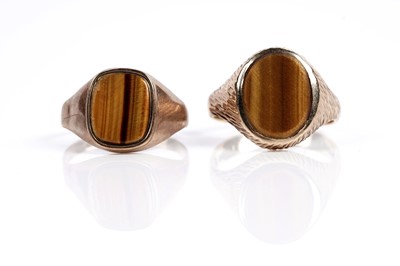 Lot 585 - Two tiger's eye quartz signet rings