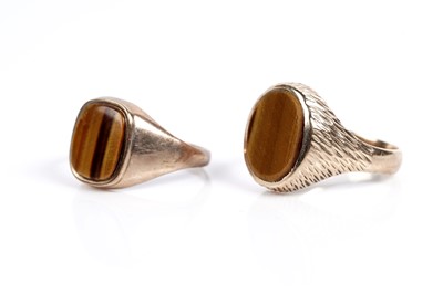Lot 585 - Two tiger's eye quartz signet rings