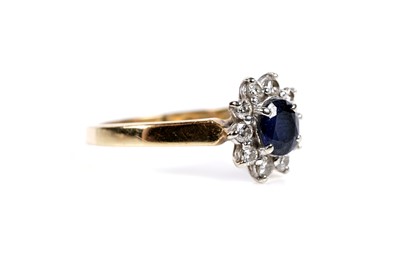 Lot 602 - A sapphire and diamond cluster ring