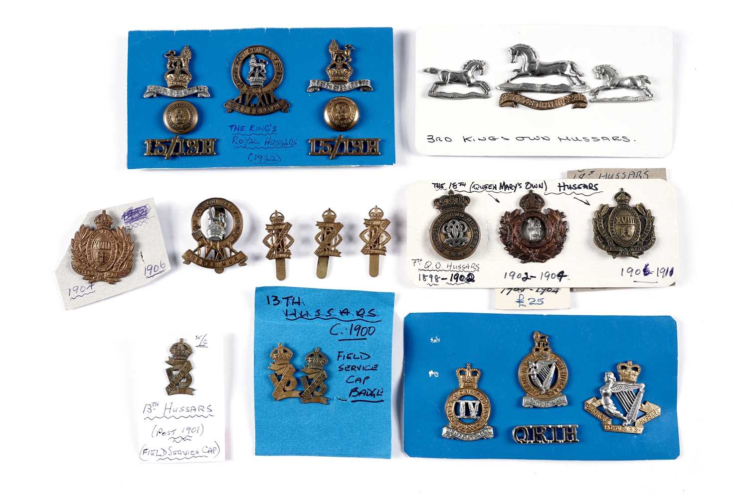 Lot 27 - Hussar regiment cap badges, collar badges and other items