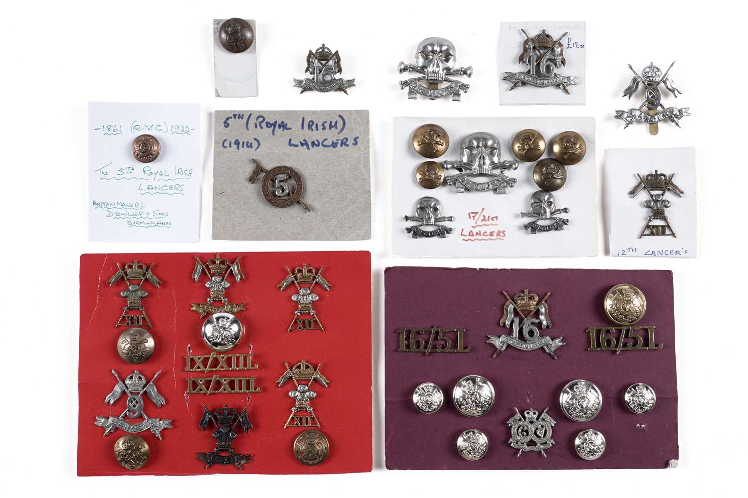 Lot 31 - Lancers regiment cap badges, collar badges, buttons, titles and other items