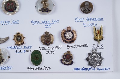 Lot 48 - A display of British and other military lapel badges, sweetheart badges, and other items