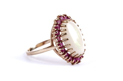 Lot 98 - An opal and ruby cocktail ring