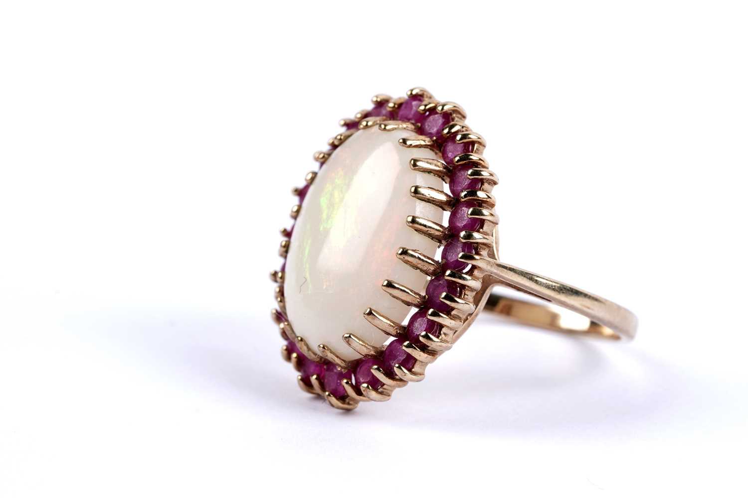 Lot 98 - An opal and ruby cocktail ring