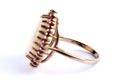 Lot 98 - An opal and ruby cocktail ring