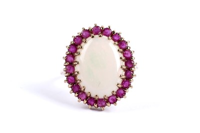 Lot 98 - An opal and ruby cocktail ring