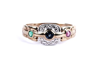 Lot 100 - An emerald, sapphire, ruby and diamond dress ring