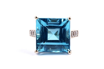 Lot 102 - A topaz and white sapphire cocktail ring