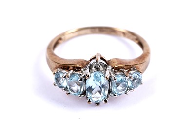 Lot 103 - A topaz and diamond dress ring