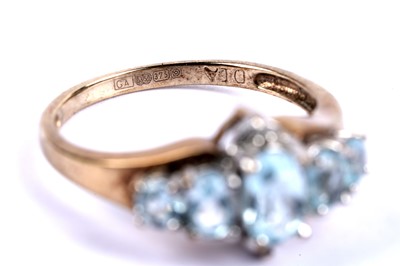 Lot 103 - A topaz and diamond dress ring