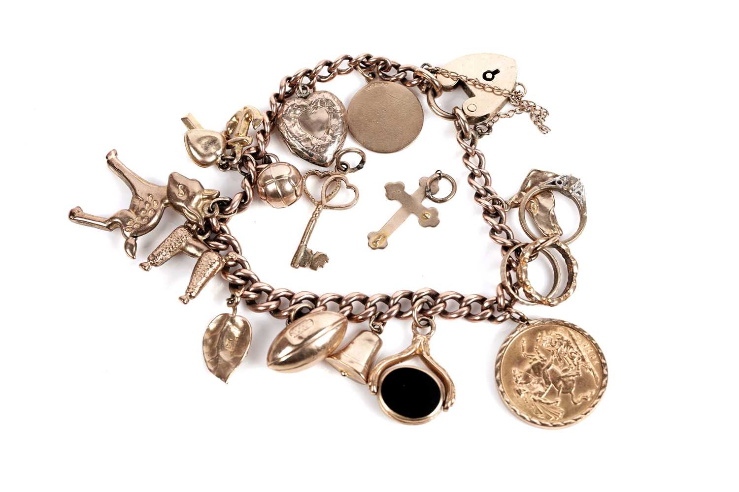 Lot 649 - A 9ct yellow gold bracelet set with a sovereign and other charms