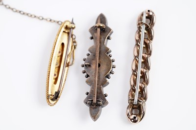 Lot 619 - Three antique gold brooches