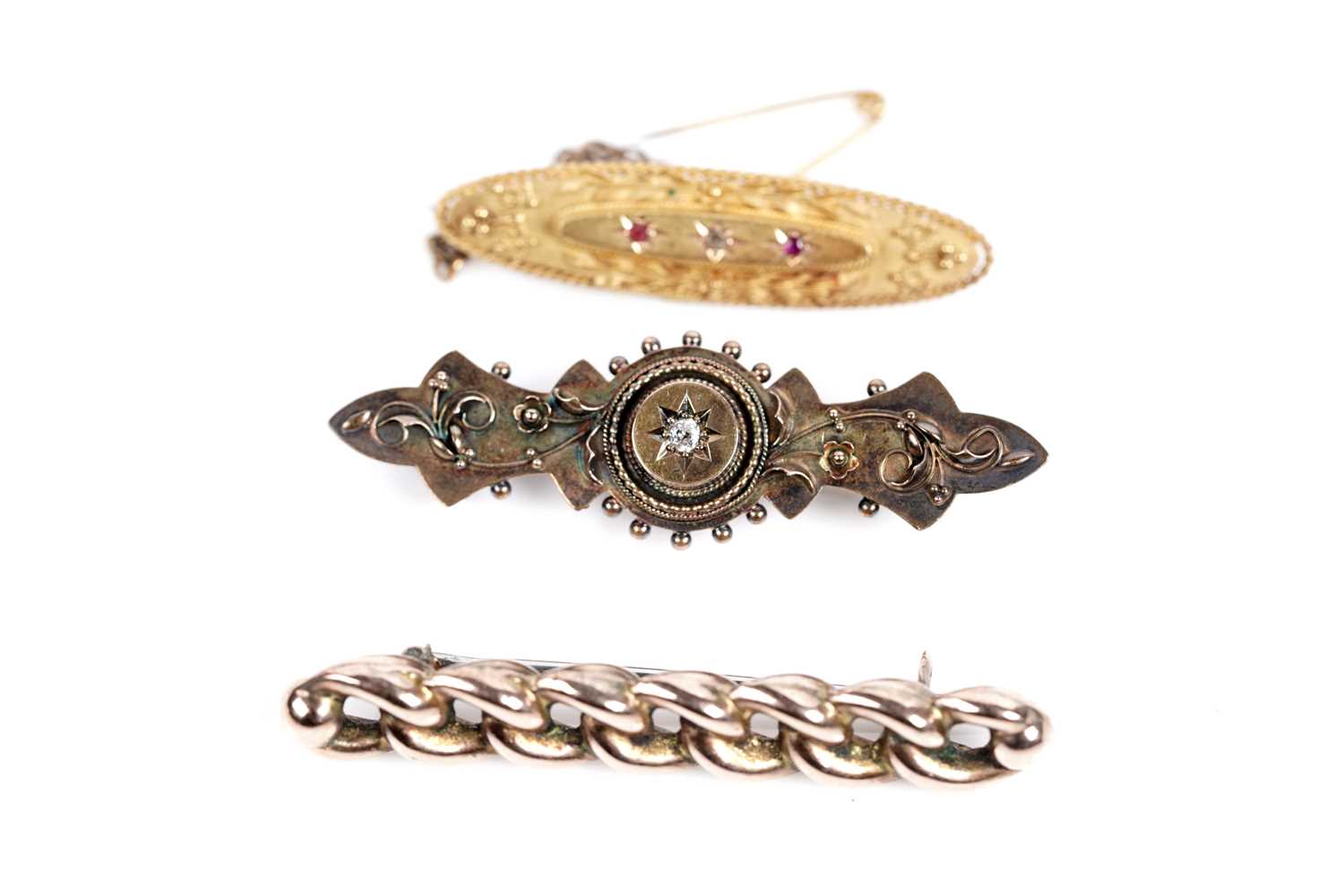 Lot 619 - Three antique gold brooches