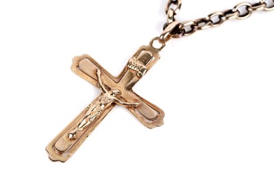 Lot 627 - A gold crucifix pendant on chain