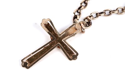Lot 627 - A gold crucifix pendant on chain