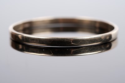Lot 631 - A 9ct yellow gold bangle