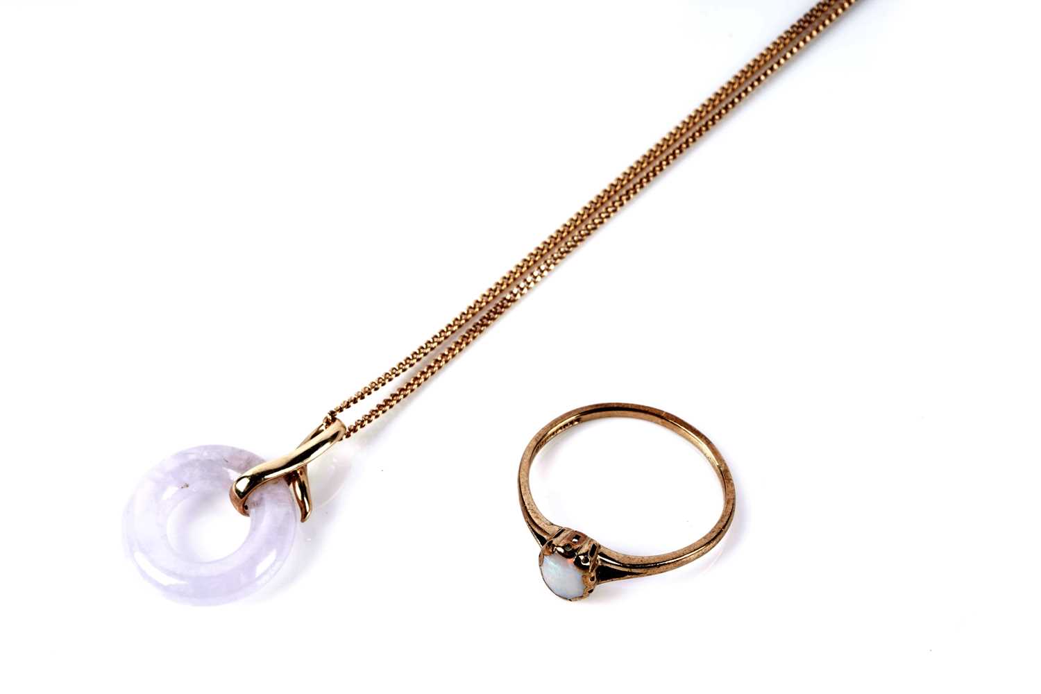 Lot 127 - An opal single stone ring; and a pendant