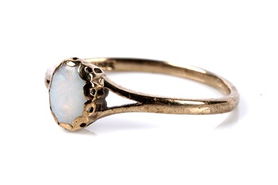 Lot 127 - An opal single stone ring; and a pendant