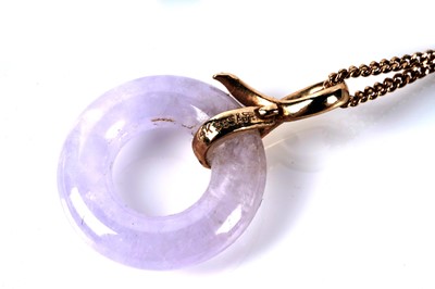 Lot 127 - An opal single stone ring; and a pendant