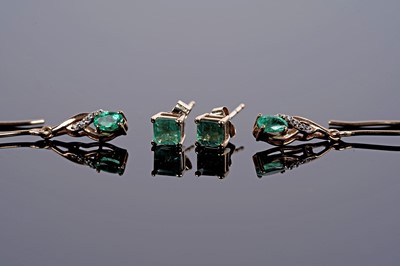 Lot 614 - A pair of emerald and white stone drop earrings; and a a pair of emerald stud earrings