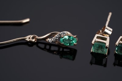 Lot 614 - A pair of emerald and white stone drop earrings; and a a pair of emerald stud earrings