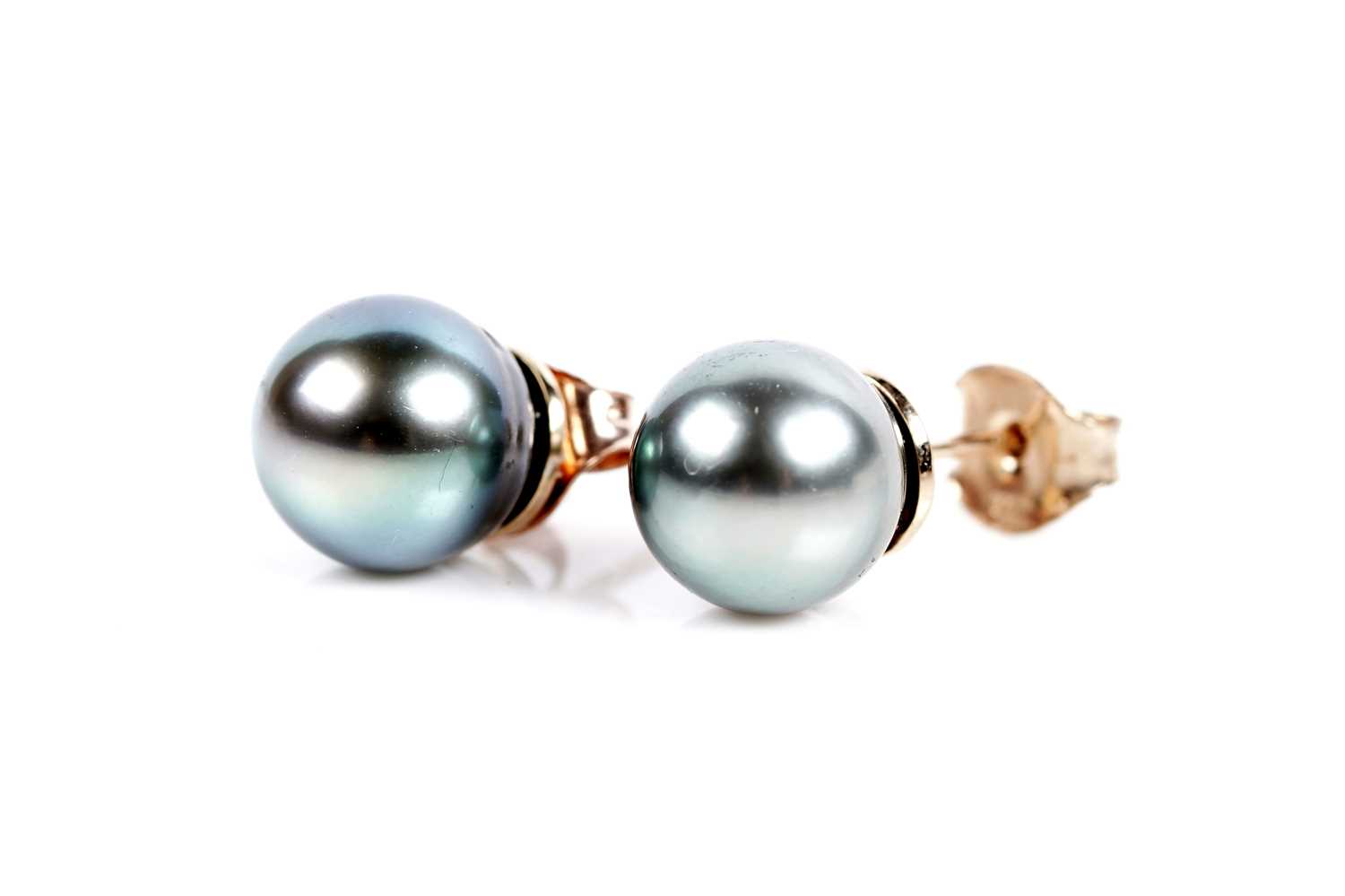 Lot 615 - A pair of cultured black pearl earrings