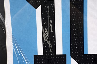 Lot 488 - A pair of framed Argentina football shirts.