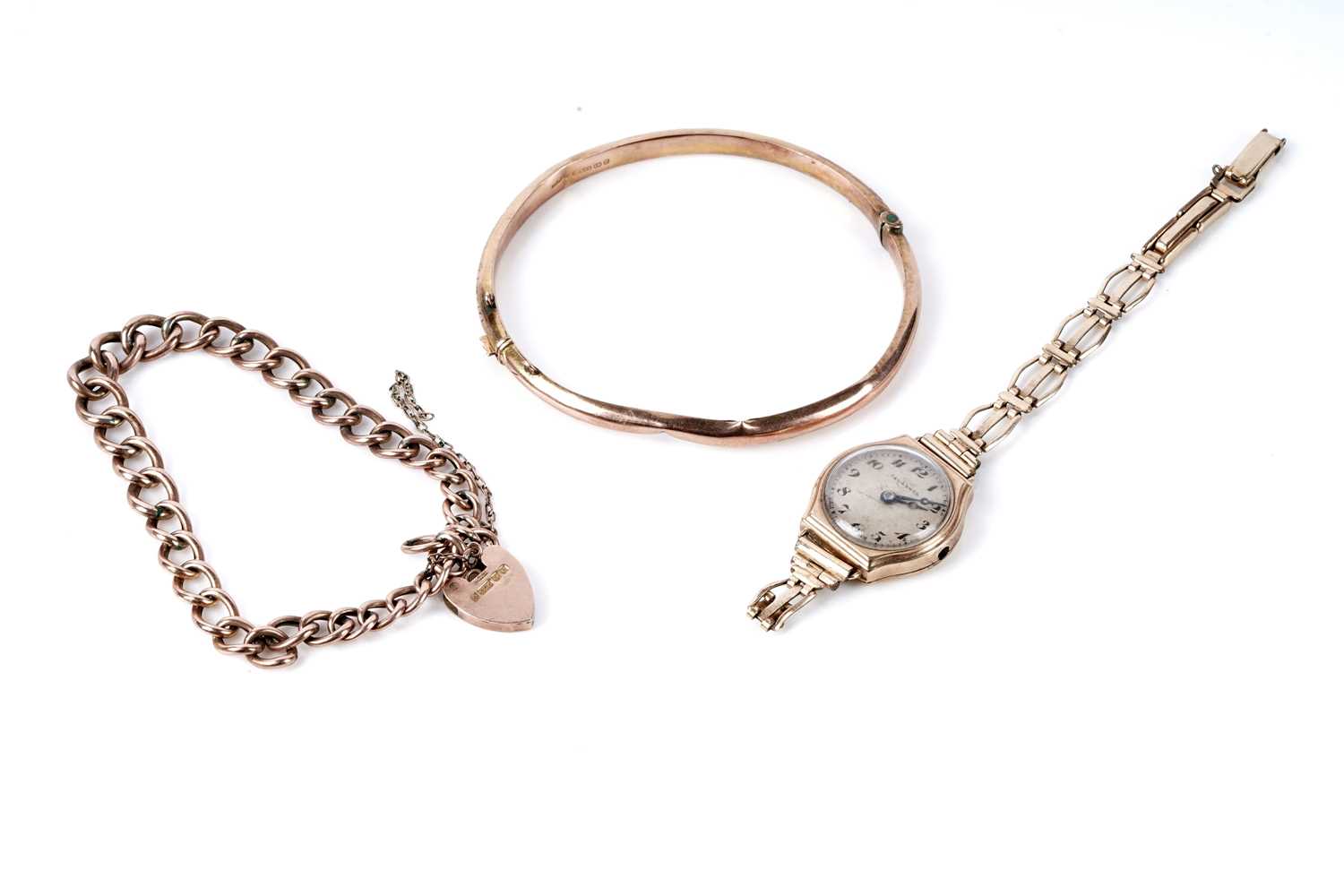 Lot 137 - A rose gold bangle; a bracelet; and a wristwatch