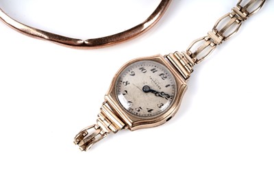 Lot 137 - A rose gold bangle; a bracelet; and a wristwatch