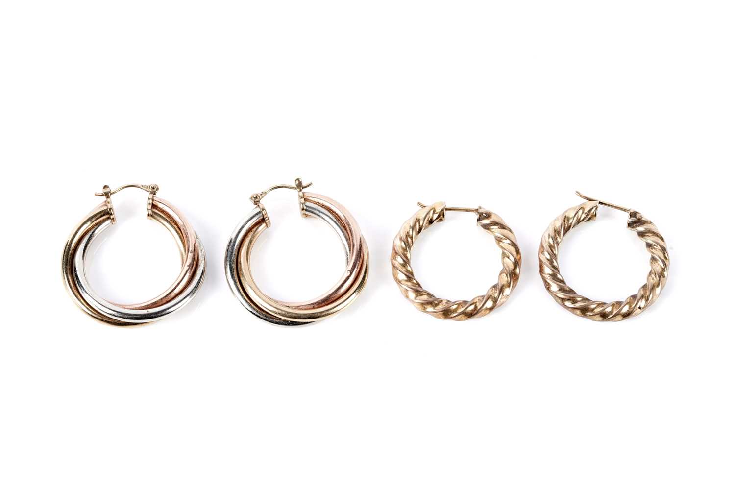 Lot 150 - Two pairs of 9ct gold hoop earrings