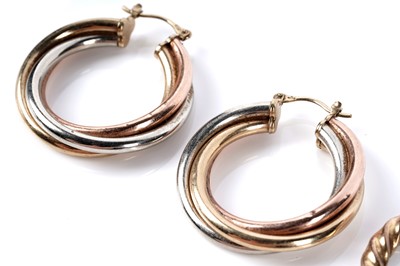 Lot 150 - Two pairs of 9ct gold hoop earrings