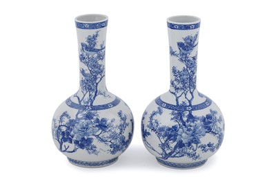 Lot 871 - A pair of Japanese blue and white vases