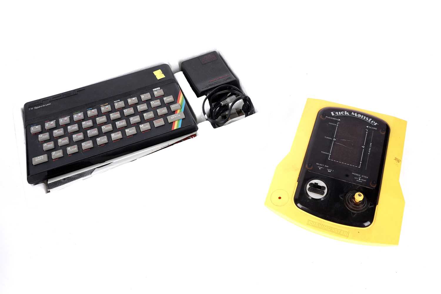 Lot 1 - A Sinclair ZX Spectrum; and a Japanese 'Puck