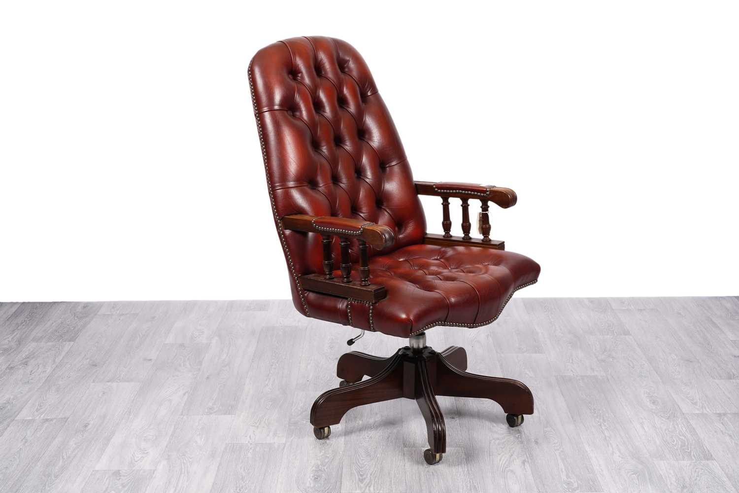 Lot 8 - Ring Mekanikk, Norway: a Chesterfield style desk chair