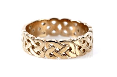 Lot 181 - A 9ct yellow gold Celtic wedding band