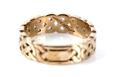 Lot 181 - A 9ct yellow gold Celtic wedding band