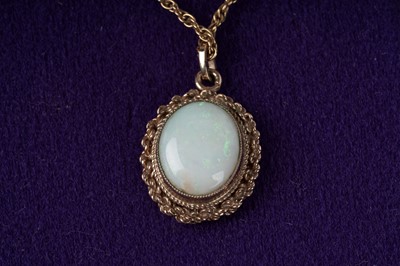Lot 187 - A suite of opal cabochon jewellery
