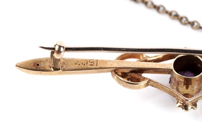 Lot 195 - An Edwardian amethyst and seed pearl bar brooch; and a horse shoe pattern bar brooch