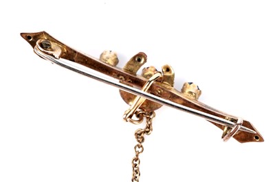 Lot 195 - An Edwardian amethyst and seed pearl bar brooch; and a horse shoe pattern bar brooch