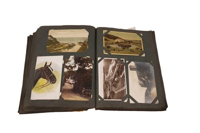 Lot 98 - Two postcard albums and contents