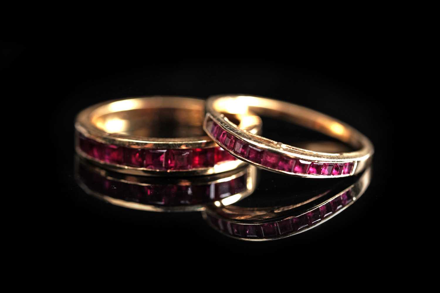 Lot 572 - Two modern ruby rings