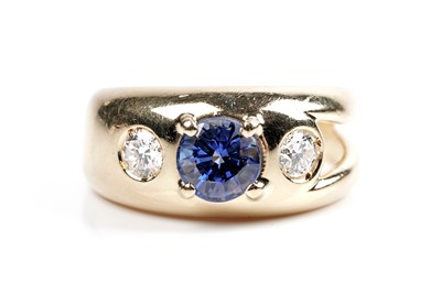 Lot 574 - A sapphire and diamond ring